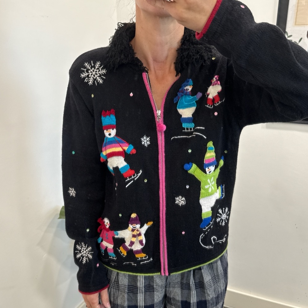 Karen Scott women’s Black Christmas sweater with Colorful Skating Design